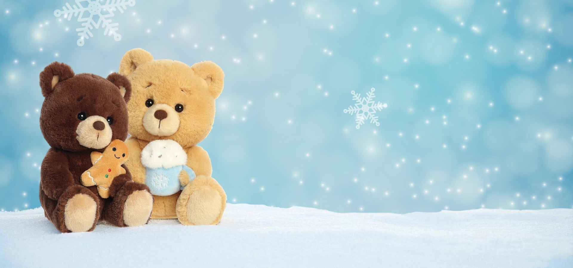 Two Aurora World teddy bears sitting together on a snowy surface with a blue snowy background