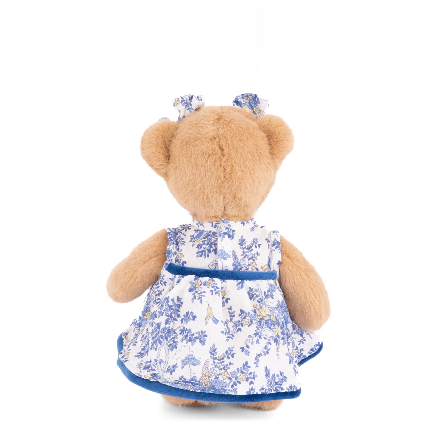 Bukowski Bears Lily 8-inch honey-tan plush bear wearing a blue-and-ivory floral dress with velvet trim and matching ear bows.