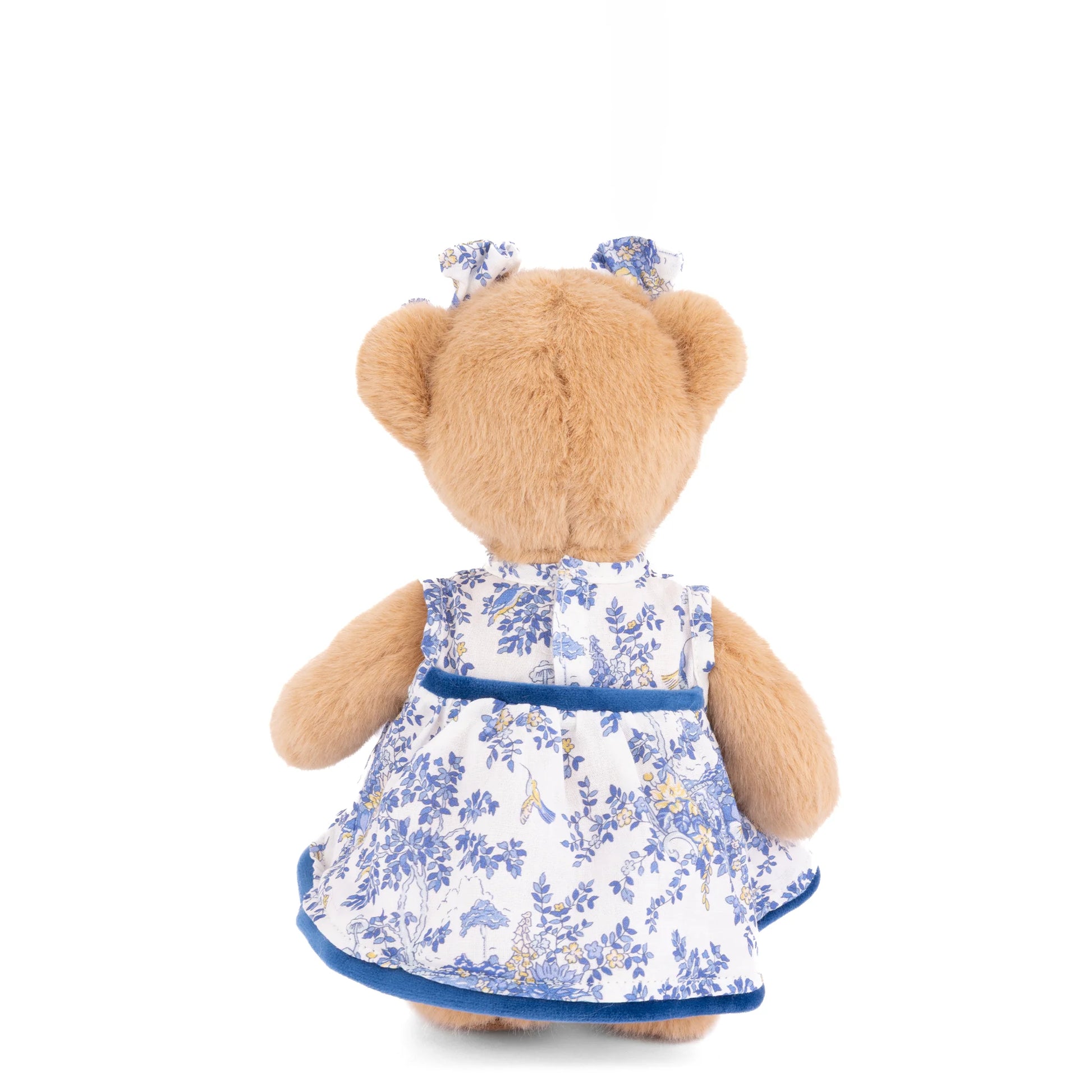 Bukowski Bears Lily 8-inch honey-tan plush bear wearing a blue-and-ivory floral dress with velvet trim and matching ear bows.