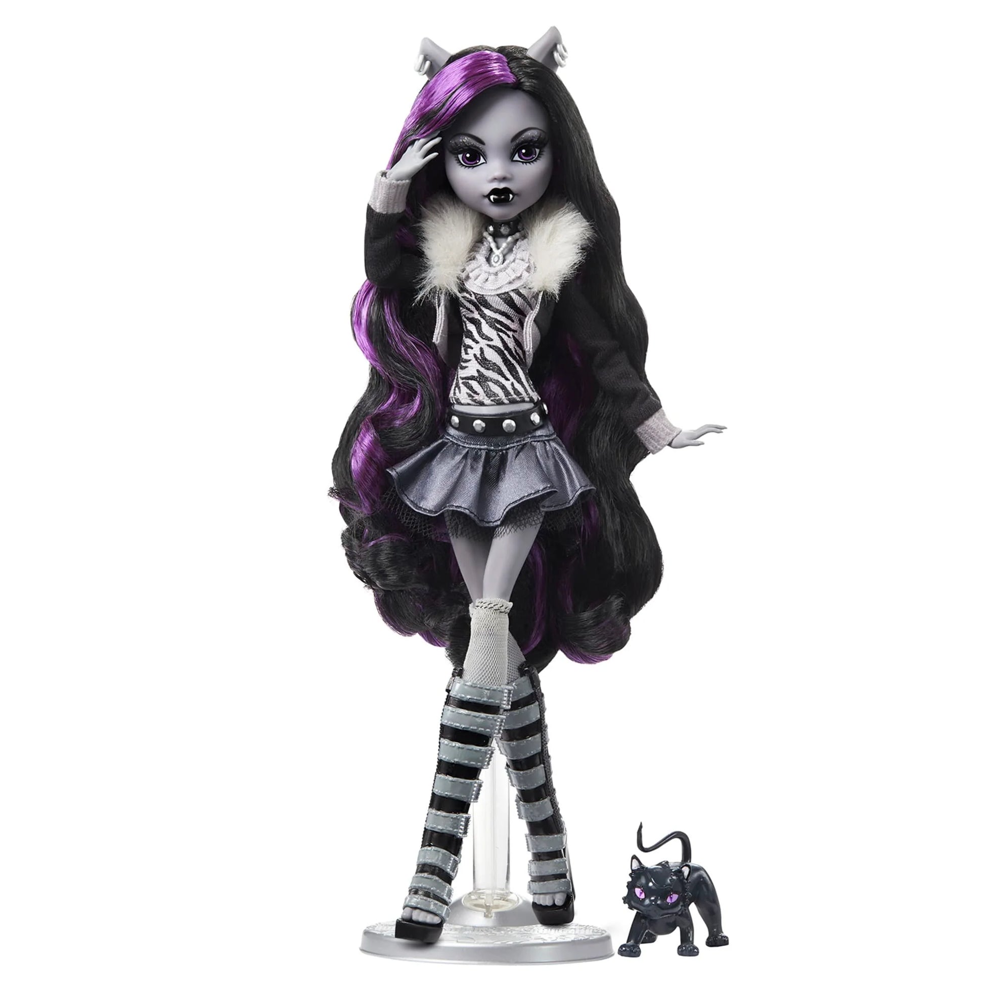 Monster High Clawdeen Wolf reel drama doll with long black hair, purple highlights, and a black and white outfit on a white background.