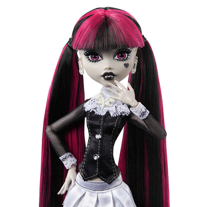 Monster High Reel Drama doll with black and pink hair, wearing a black and white outfit on a white background