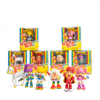 Collection of Rainbow Brite toys and packaging on a white background