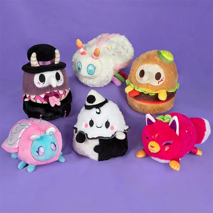 Set of colorful plush toys on a purple background