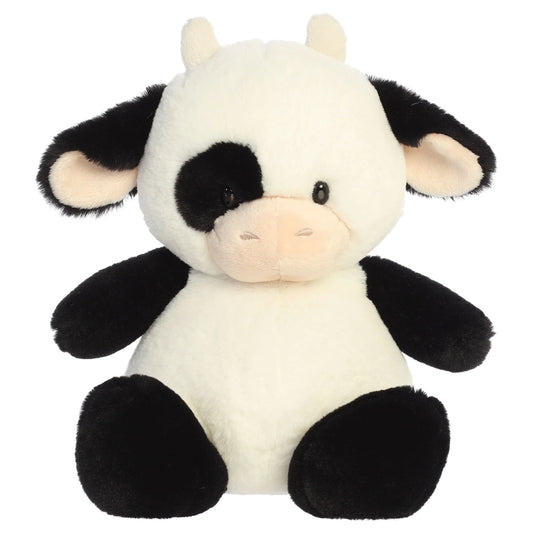 Aurora Dumplin' plush black and white cow featuring a plump round body, soft snout, and black eye patch.