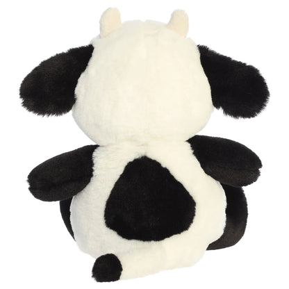 Aurora Dumplin' plush black and white cow featuring a plump round body, soft snout, and black eye patch.