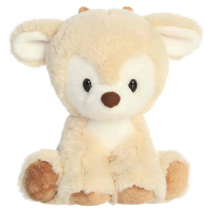 Aurora Dashing Reindeer plush in buttercream cream fur sitting upright with dark eyes, a brown nose, and brown hooves.