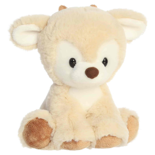 Aurora Dashing Reindeer plush in buttercream cream fur sitting upright with dark eyes, a brown nose, and brown hooves.