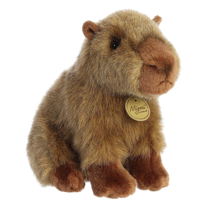 Aurora Miyoni Capybara lifelike plush stuffed animal with a sturdy sitting posture, rich brown textured fur, and gentle black eyes.