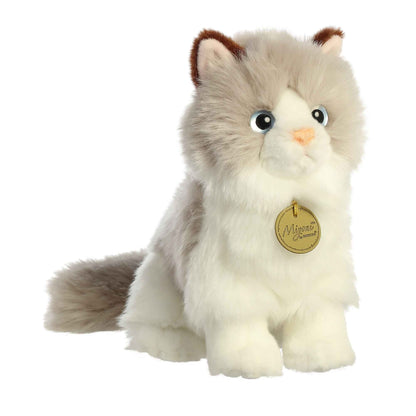 Aurora Miyoni Ragdoll Cat lifelike plush stuffed animal sitting with a white-grey coat, adorable blue eyes, and brown-tipped ears.