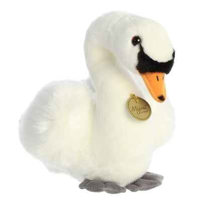 Aurora Miyoni Swan plush animal featuring fluffy white feathers, an orange and black beak, and a golden Miyoni chest tag.