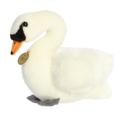 Aurora Miyoni Swan plush animal featuring fluffy white feathers, an orange and black beak, and a golden Miyoni chest tag.
