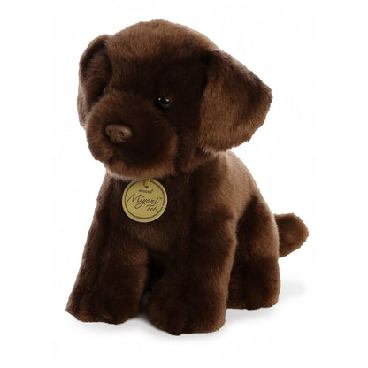 Aurora Miyoni Tots Chocolate Lab Pup lifelike baby plush stuffed animal sitting with soft chocolate-brown fur, floppy ears, and big expressive eyes.