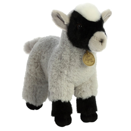 Aurora Miyoni Tots Goat Kid plush stuffed animal featuring soft grey fur, black face markings, and a standing posture.