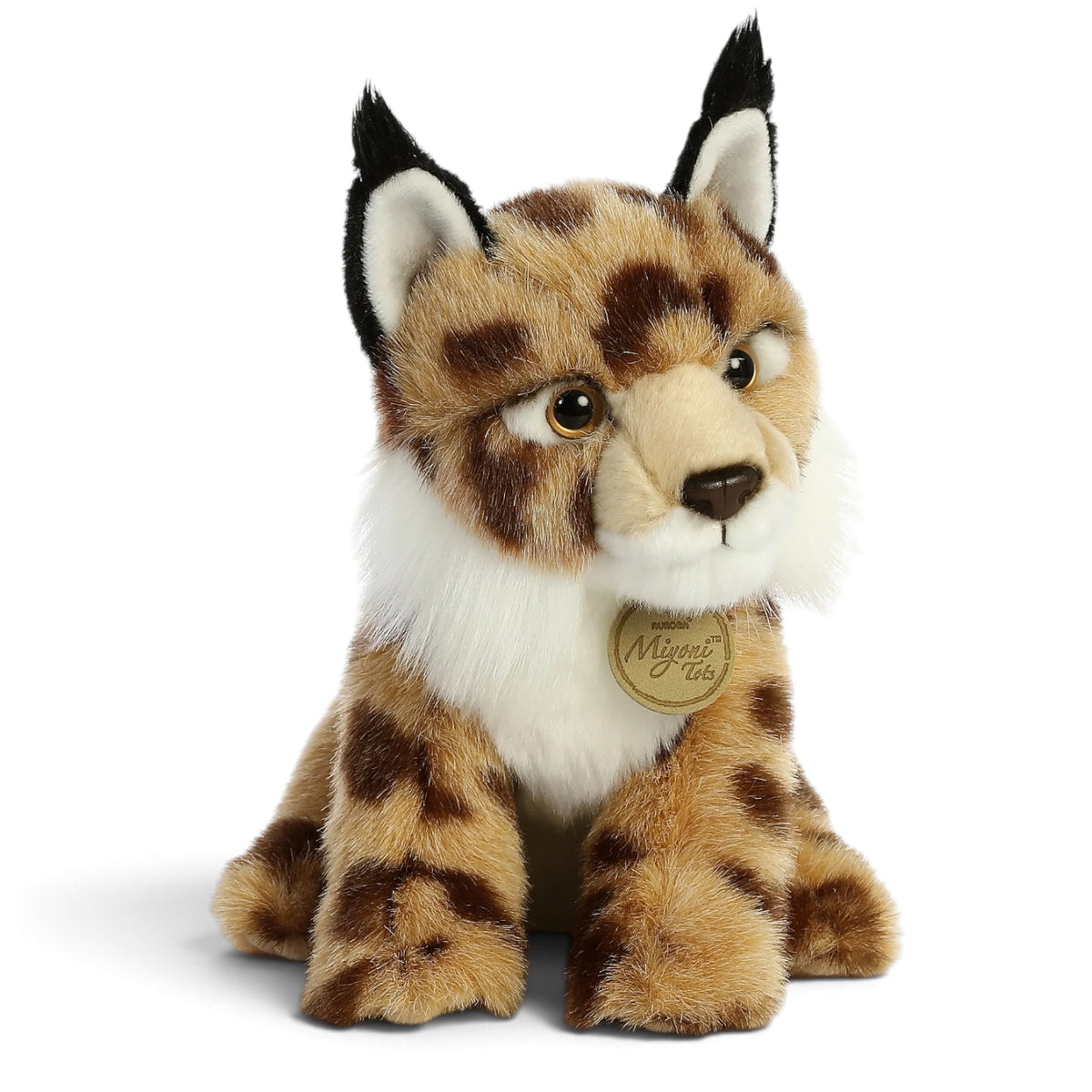 Aurora Miyoni Tots Lynx lifelike baby plush stuffed animal sitting with patterned spotted fur, pointed ears with black tufts, and a white chest.