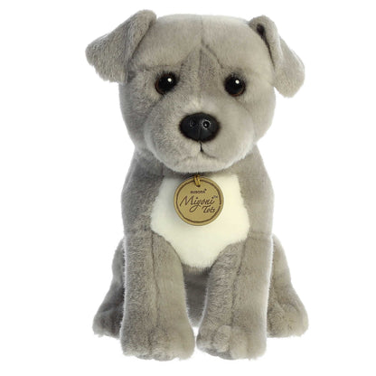 Aurora Miyoni Tots Pit Bull Puppy lifelike baby plush stuffed animal sitting with soft grey fur, a white chest patch, and soulful dark eyes.