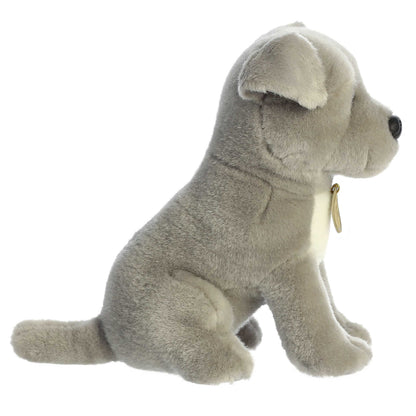 Aurora Miyoni Tots Pit Bull Puppy lifelike baby plush stuffed animal sitting with soft grey fur, a white chest patch, and soulful dark eyes.