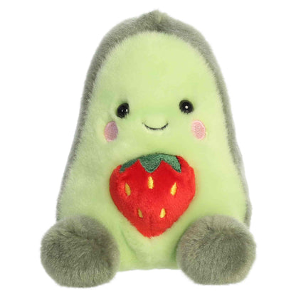 Aurora Palm Pals Aimee Strawberry Avocado plush toy featuring soft green fur, a dark rind trim, an embroidered strawberry belly, and rosy cheeks sitting upright.