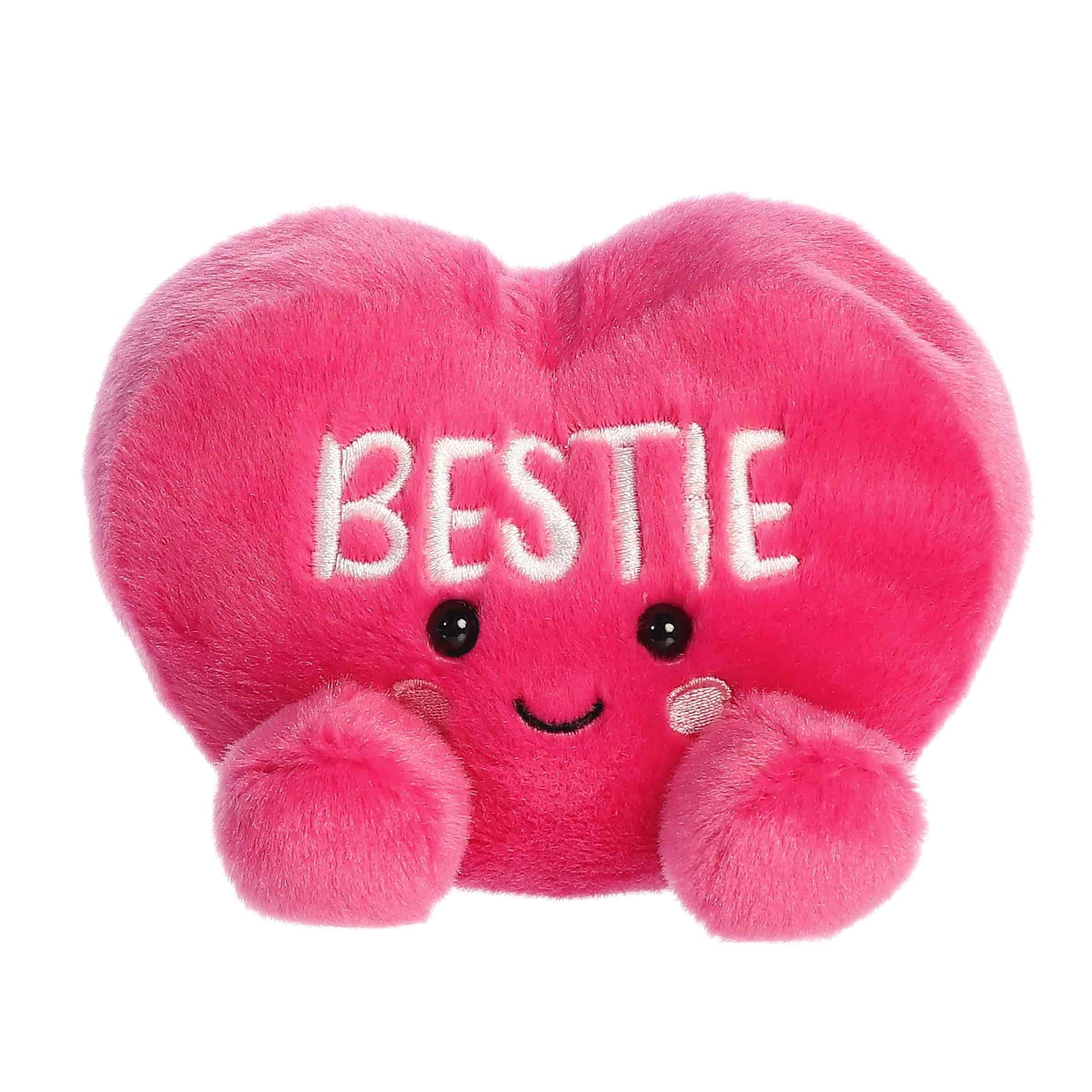 Product view of Aurora Palm Pals Bestie Candy Heart, a small hot pink plush heart with embroidered text.