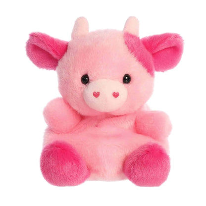 Product view of Aurora Palm Pals Blossom Pink Cow, a soft pink plush cow with dark pink spots and heart-shaped nostrils.