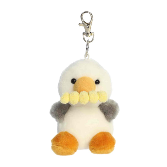 Aurora Palm Pals plush clip-on featuring Buoy the Seagull, a white and gray bird holding a french fry in its beak.