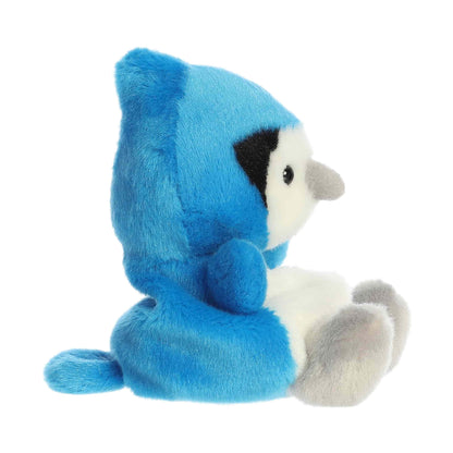 Side view of Aurora Palm Pals Chatters Blue Jay, a small blue bird plush.