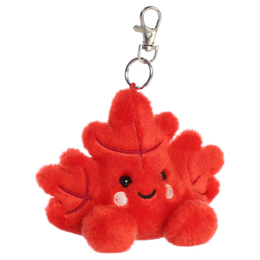 Aurora Palm Pals Fall Maple Leaf plush clip-on featuring deep red fur, embroidered rosy cheeks, stitched leaf patterns, and a silver swivel clip.