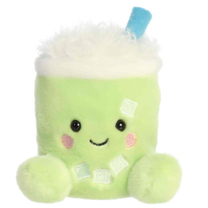 Aurora Palm Pals Jade Iced Matcha Latte plush toy featuring matcha-green fur, fluffy white foam top, blue straw, embroidered ice cubes, and rosy cheeks sitting upright.