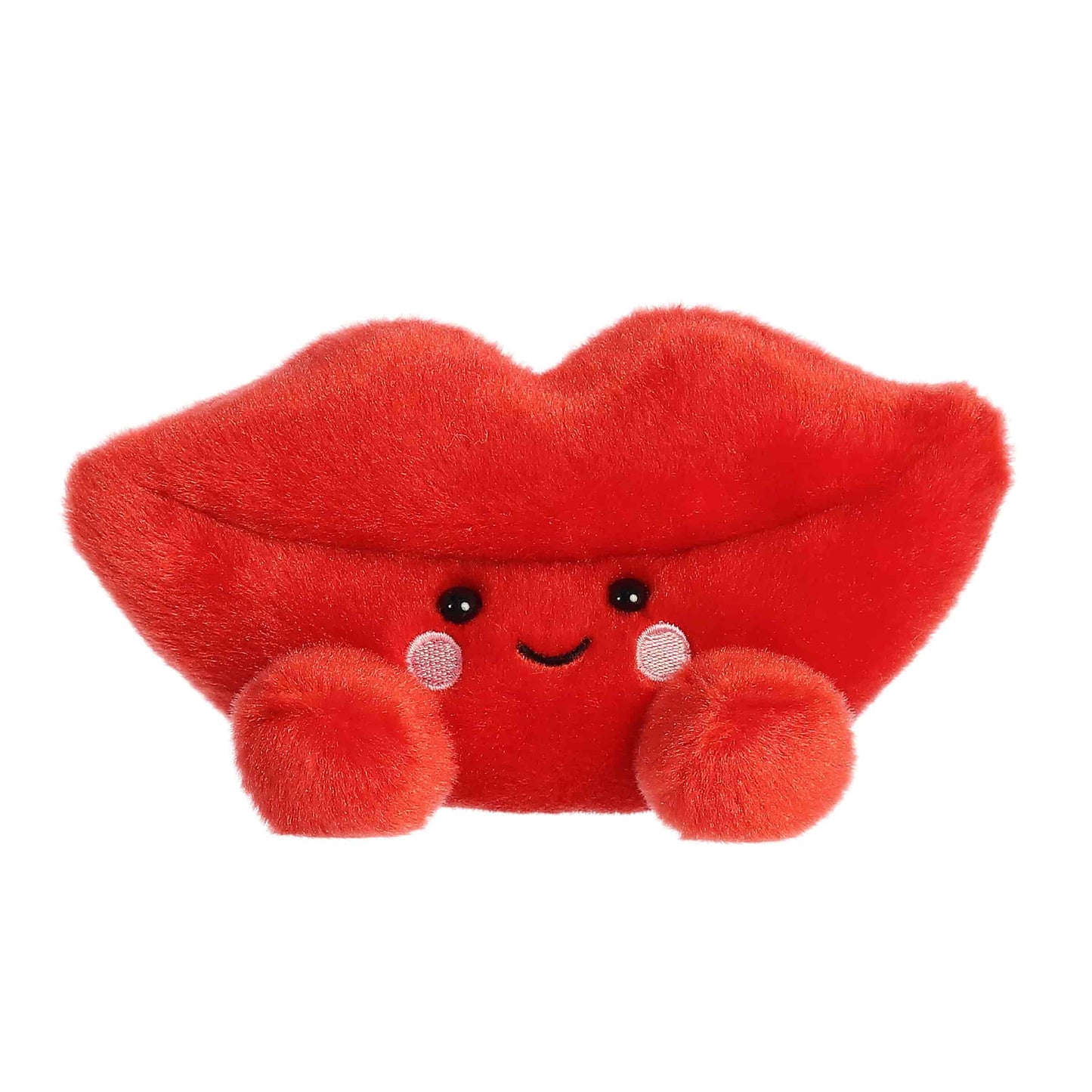 Product view of Aurora Palm Pals Kissie Lips, a bright red plush shaped like lips with a smile and rosy cheeks.