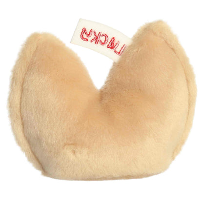 Aurora Palm Pals Lucky Fortune Cookie plush food character featuring golden-brown fur, an embroidered fortune slip reading LUCKY, and rosy cheeks sitting upright.