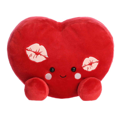 Product view of Aurora Party-Sized Palm Pals Kimi Kisses Heart, a large 13-inch red plush heart with embroidered kiss marks.
