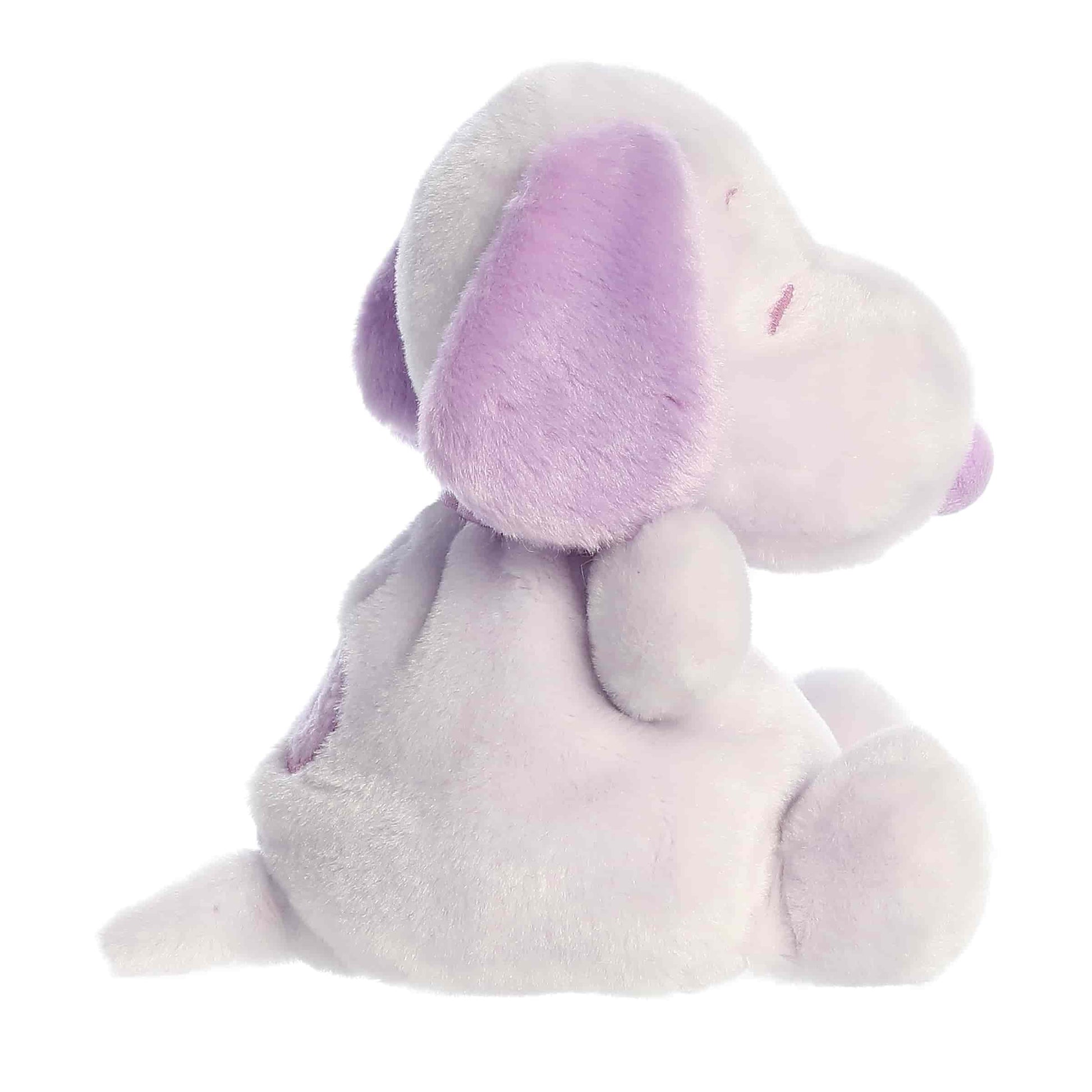 Side view of Aurora Palm Pals Peanuts Snoopy Purple, a small beagle plush.