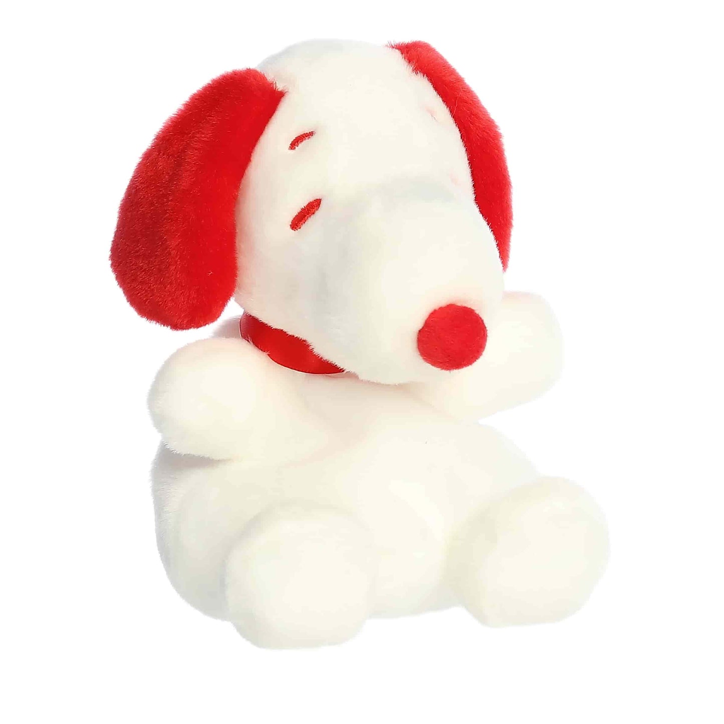 Product view of Aurora Palm Pals Peanuts Snoopy Red & White Valentine's Day plush featuring white fur, red ears, a red nose, and a red ribbon.