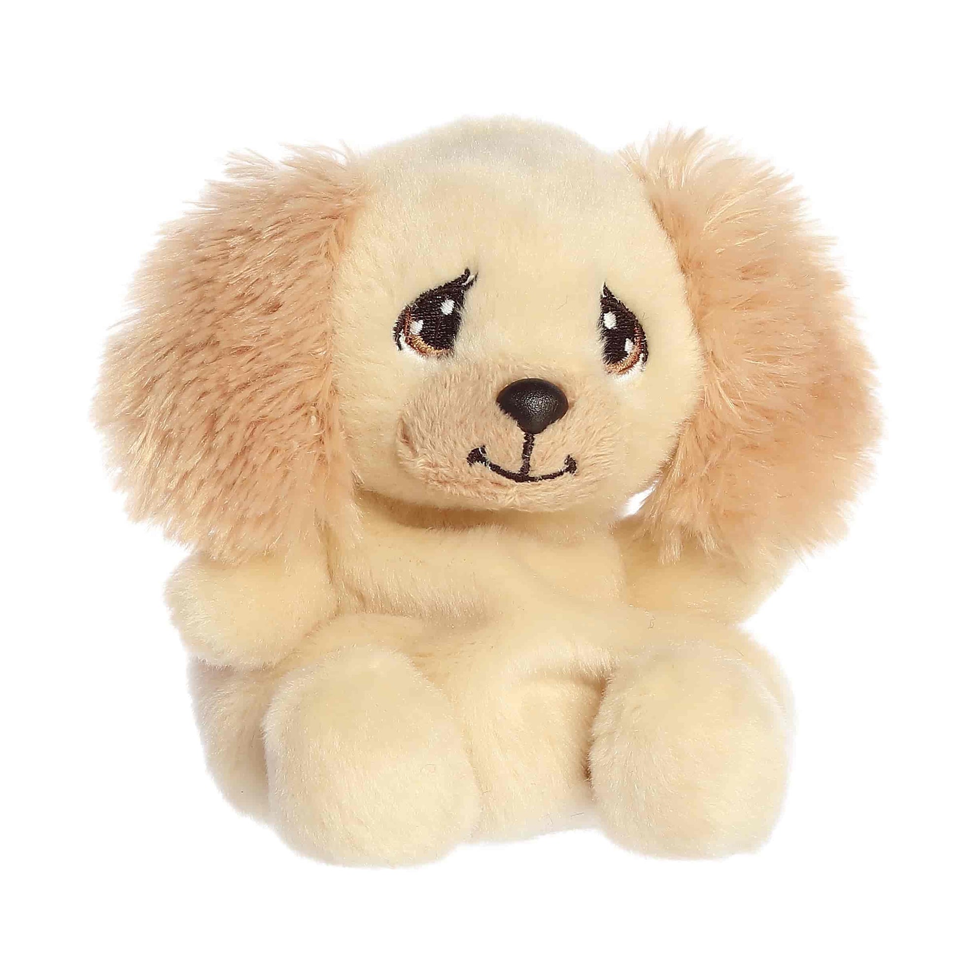 Aurora Palm Pals Precious Moments plush featuring Daniel Spaniel, a cute tan dog with fluffy ears and signature teardrop eyes.