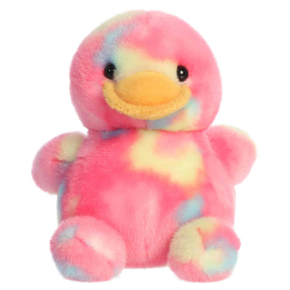 Aurora Palm Pals Shimmer Rubber Ducky plush animal featuring bright pink tie-dye fur with pastel spots, an orange bill, and dark eyes sitting upright.