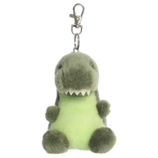 Aurora Palm Pals Tyranno Rex plush clip-on featuring soft green fur, light green belly, felt teeth, and a silver swivel clasp.