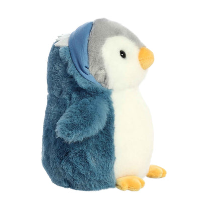 Plush toy penguin with a blue coat on a white background