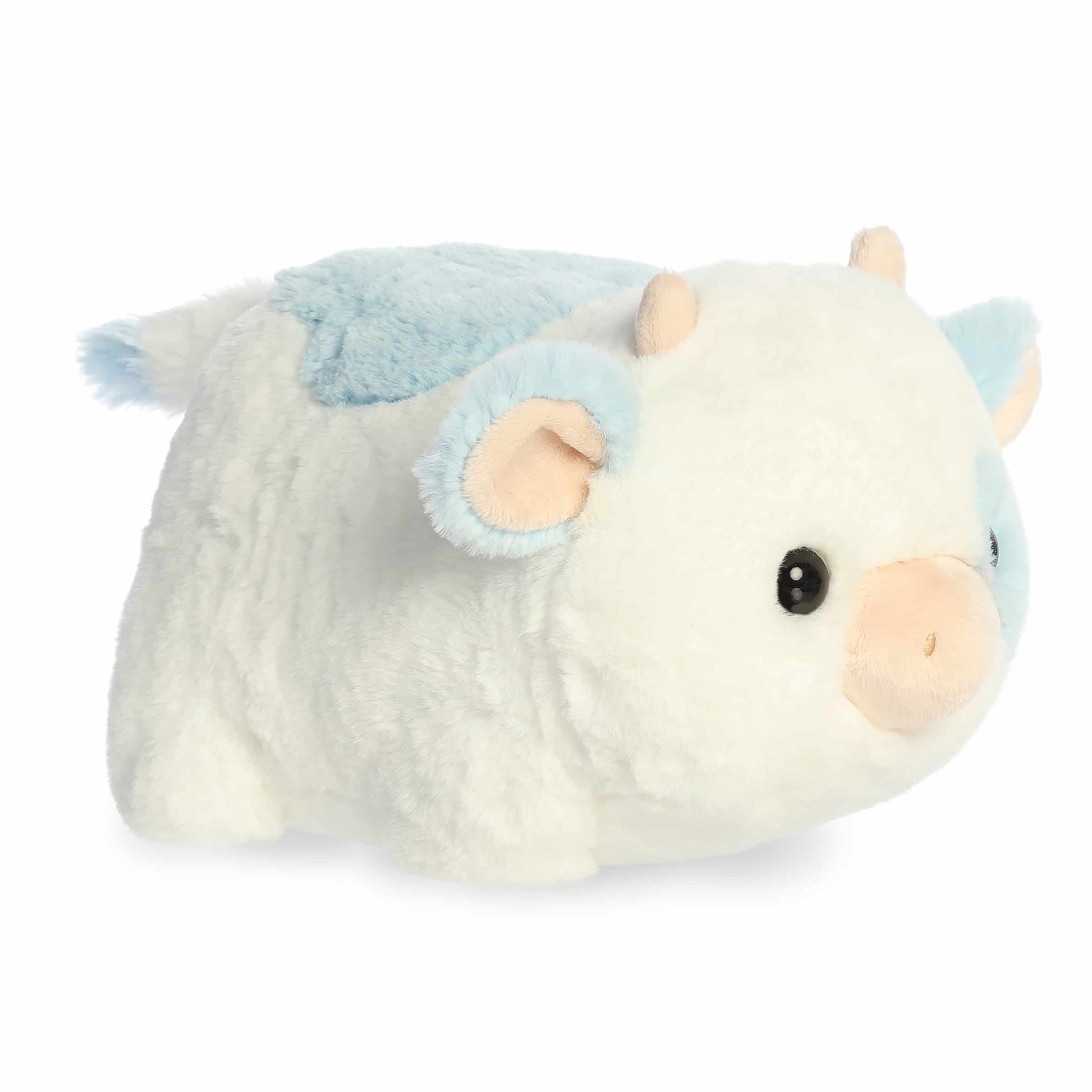 A product photo of the 10-inch Aurora Spudsters Bonnie Blueberry Cow, a white, potato-shaped plush cow with soft blue spots and a pink nose.