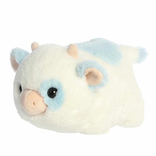 A product photo of the 10-inch Aurora Spudsters Bonnie Blueberry Cow, a white, potato-shaped plush cow with soft blue spots and a pink nose.