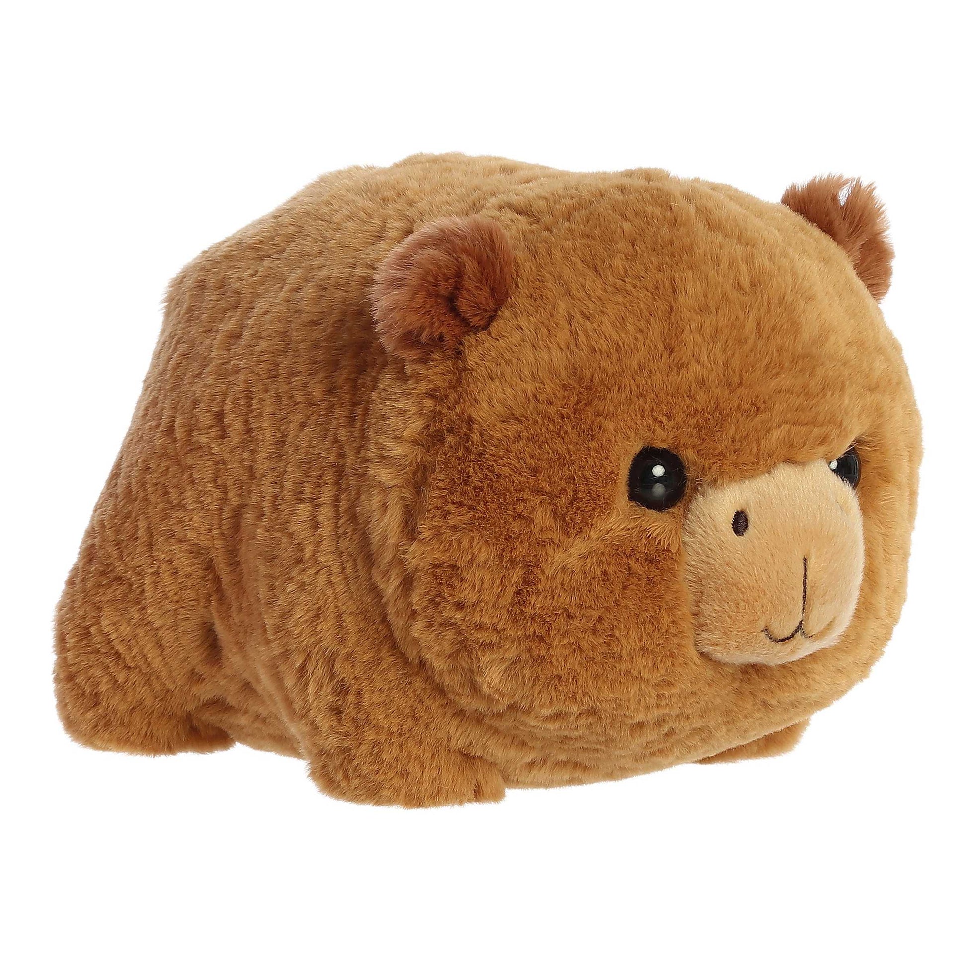 A product photo of the 10-inch Aurora Spudsters Carmen Capybara, a brown, potato-shaped plush capybara with a gentle smile.
