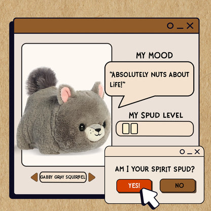 Plush toy resembling a gray squirrel with a digital interface on a beige background