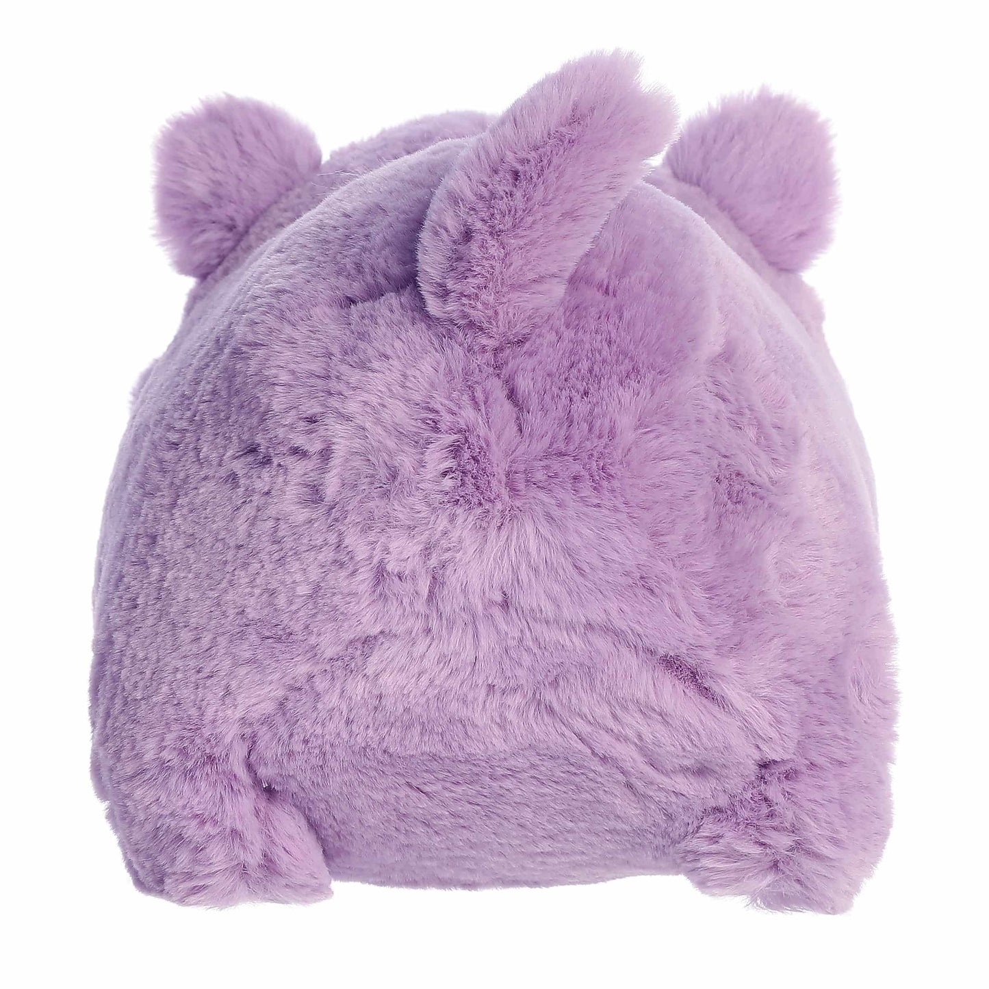 Back view of A product photo of the 10-inch Aurora Spudsters Harlo Hippo, a vibrant purple, potato-shaped plush with a friendly face and small tusks.