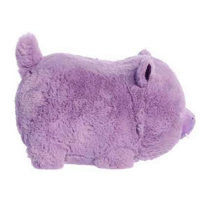 Side view of A product photo of the 10-inch Aurora Spudsters Harlo Hippo, a vibrant purple, potato-shaped plush with a friendly face and small tusks.