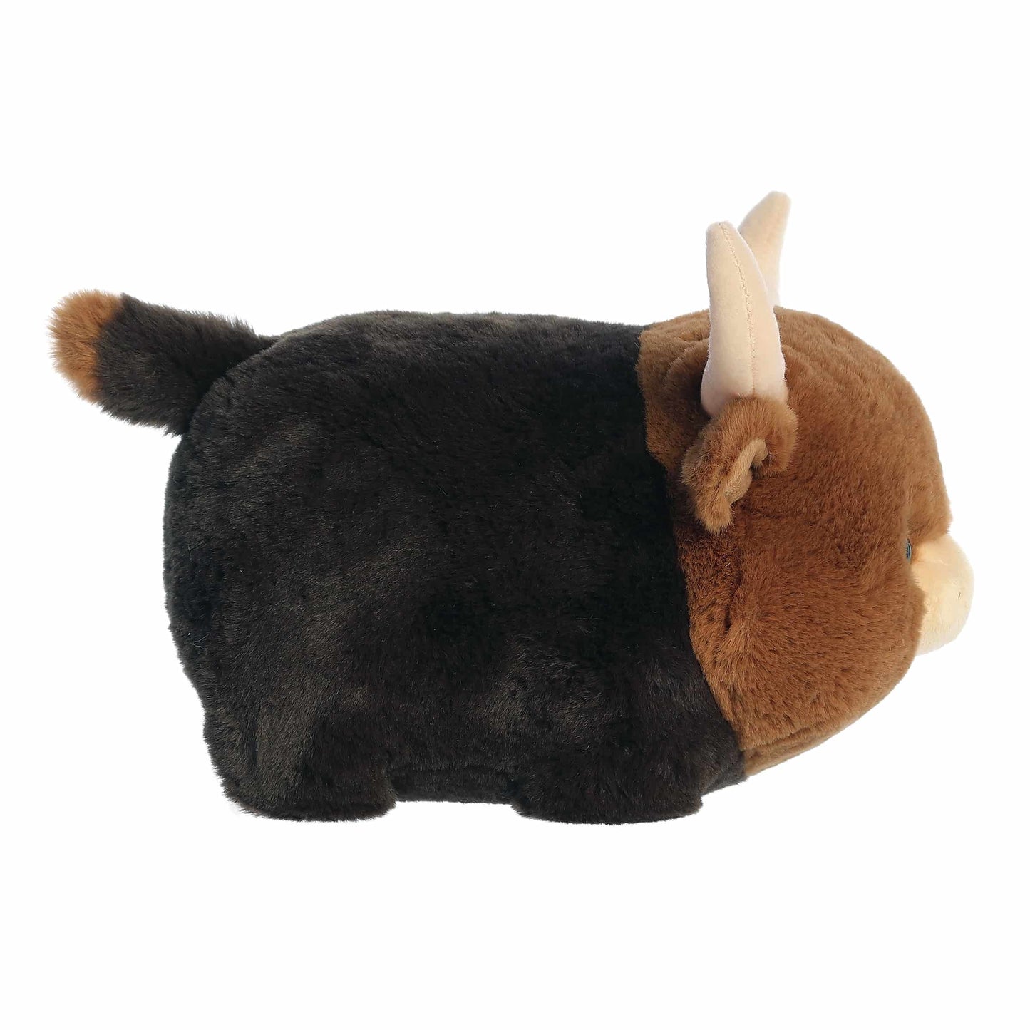 Side view of A product photo of the 10-inch Aurora Spudsters Layton Longhorn Cow, a brown and black, potato-shaped plush cow with large curved horns.