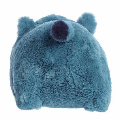 Back view of A product photo of the 10-inch Aurora Spudsters Rio Rhino, a bold blue, potato-shaped rhino plush with a small white horn.