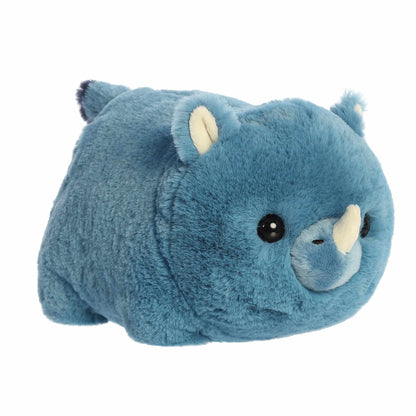 A product photo of the 10-inch Aurora Spudsters Rio Rhino, a bold blue, potato-shaped rhino plush with a small white horn.
