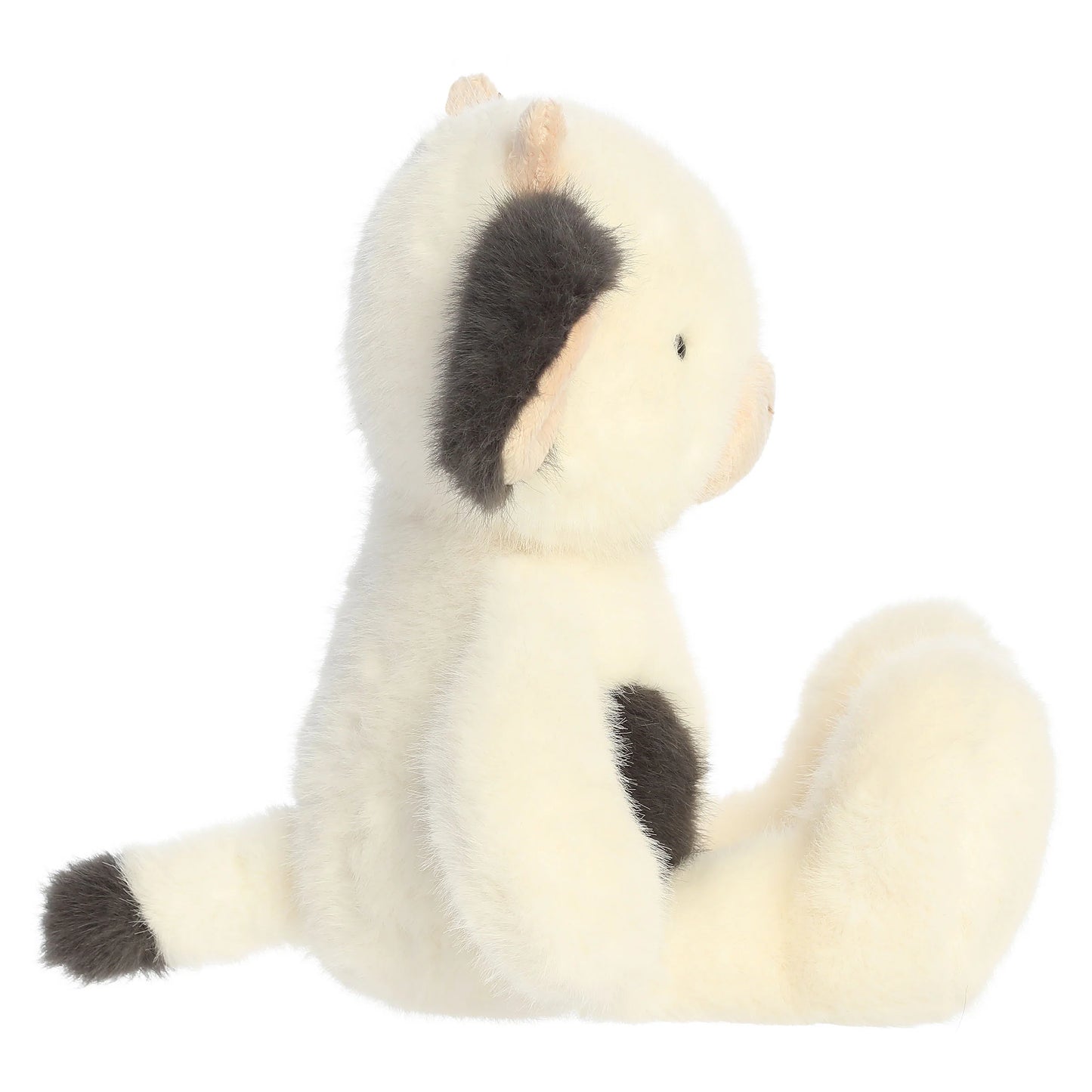 Aurora The Thicket Tales 12-inch Clover Cow plush toy featuring soft eggshell fur, dark spots, and delicate pink ears.