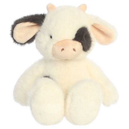 Aurora The Thicket Tales 12-inch Clover Cow plush toy featuring soft eggshell fur, dark spots, and delicate pink ears.