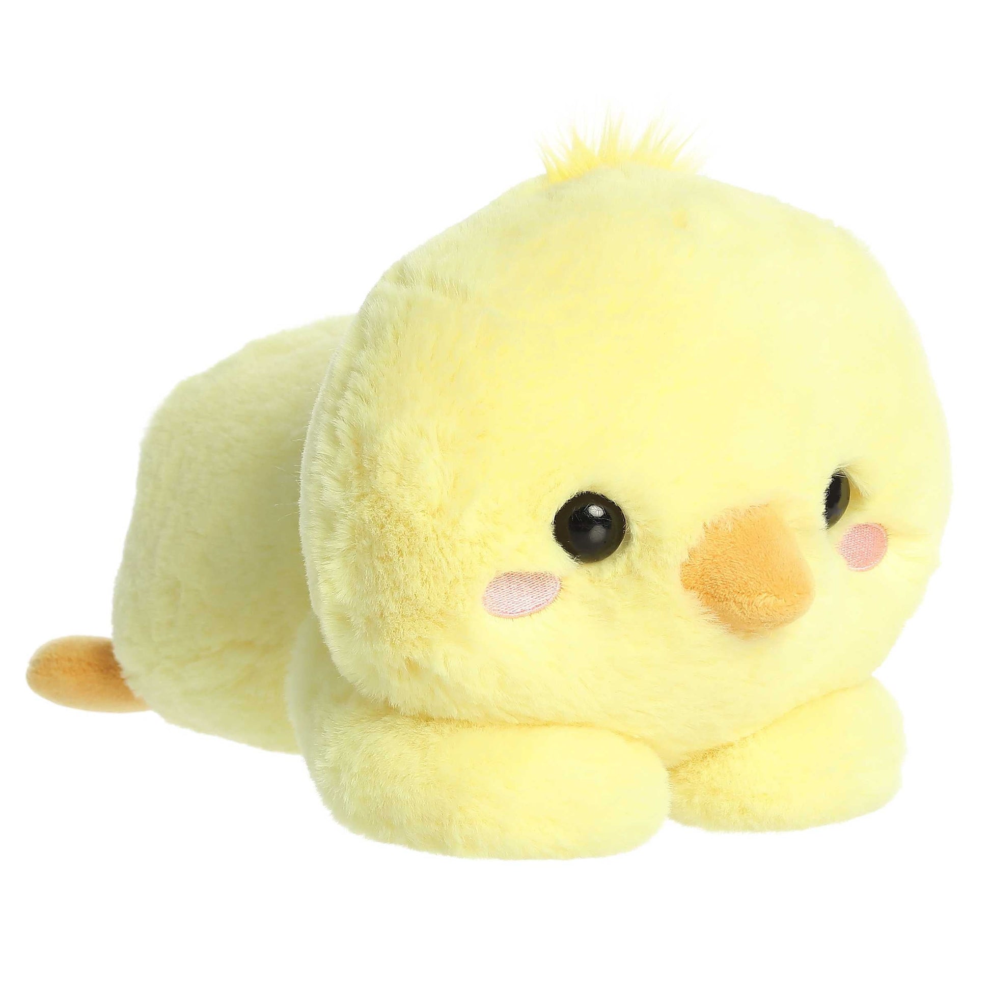 A product photo of the 12-inch Aurora Too Cute Daffodil Chick plush, a soft yellow chick, shown lying belly-down with its paws sprawled out on a white background.