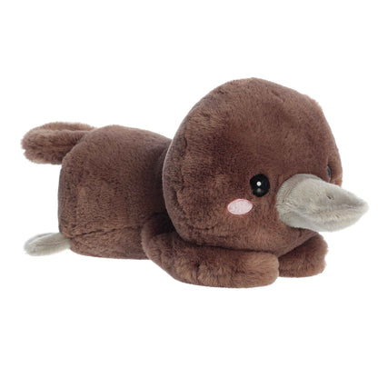 A product photo of the 9-inch Aurora Too Cute Pimmy Platypus plush, a brown platypus, shown lying belly-down with its flippers sprawled out on a white background.