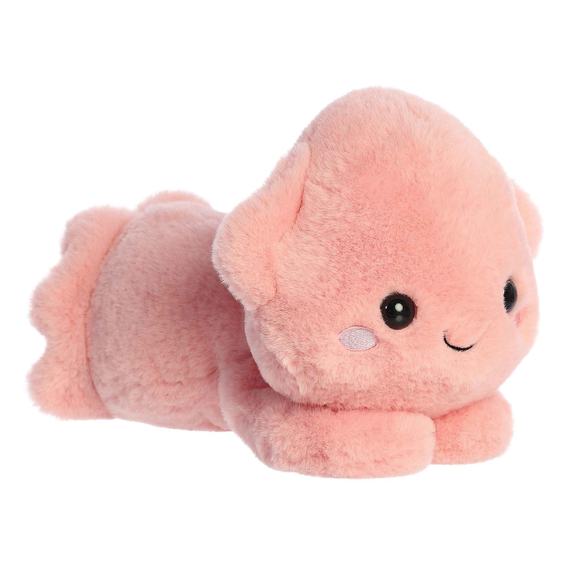 A product photo of the 9-inch Aurora Too Cute Skyler Squid plush, a pastel pink squid, shown lying belly-down with its tentacles sprawled out on a white background.